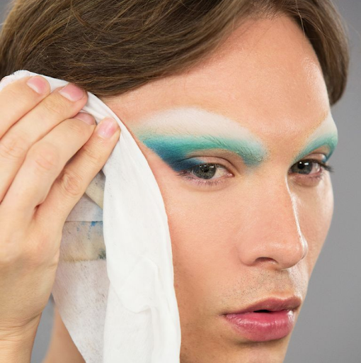 Miss Fame using makeup wipes
